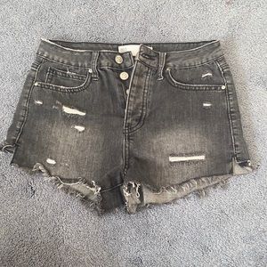 Black lightly distressed high waisted jean shorts